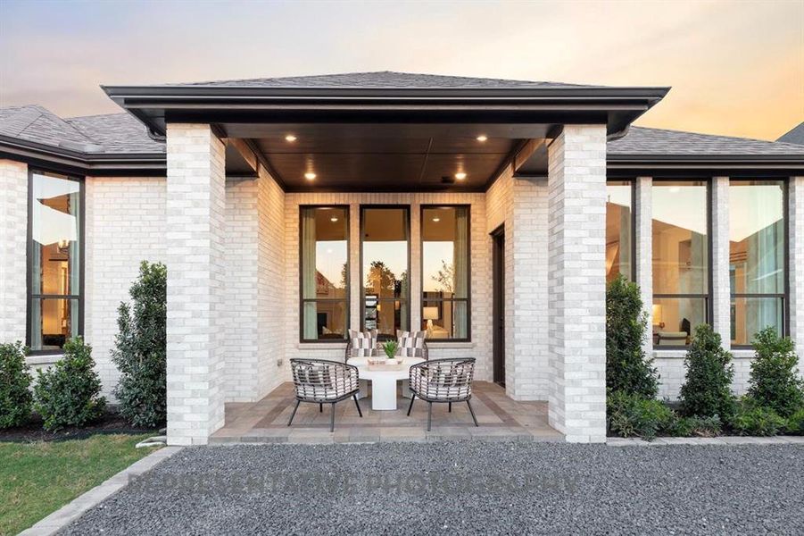 Exterior details and patio area of a home in Wildflower Ranch, Dish (Image 3).
