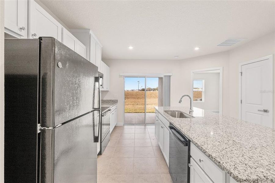 Furnished interior view inside a new home in , Lady Lake (Image 6). Furnished interior view inside a new home in , Lady Lake (Image 6).
