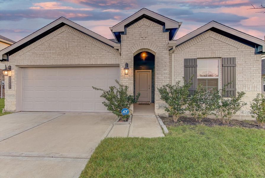 Front exterior of a new home in , Baytown, TX, highlighting curb appeal (Image 2).