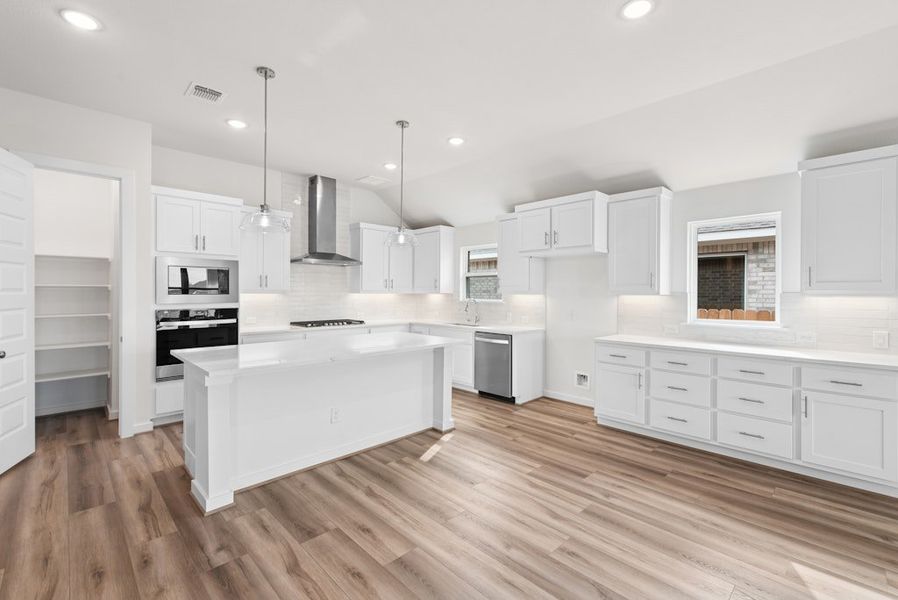Furnished interior view inside a new home in University Heights, Round Rock (Image 10).