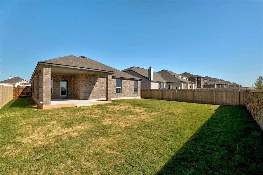 Expansive backyard with room for outdoor entertaining and play.