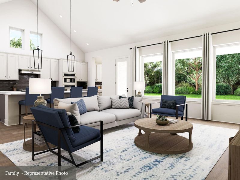 Big picture windows & cathedral ceiling compliment this spacious Living area