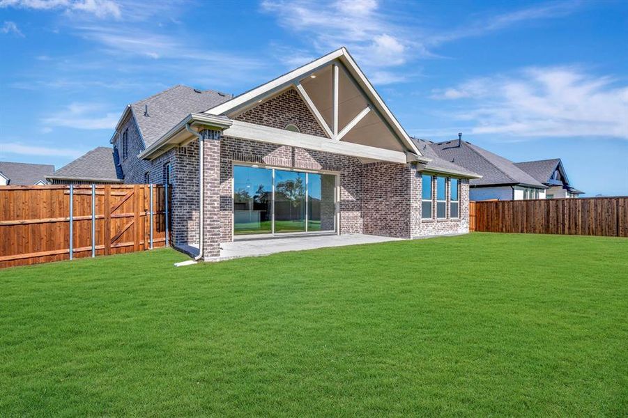 Exterior details and patio area of a home in Kreymer at the Park, Wylie (Image 24). Exterior details and patio area of a home in Kreymer at the Park, Wylie (Image 24).