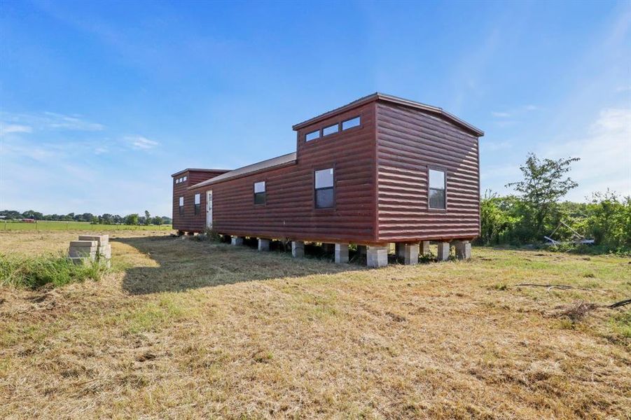 Front exterior of a new home in , Grand Saline, TX, highlighting curb appeal (Image 8).