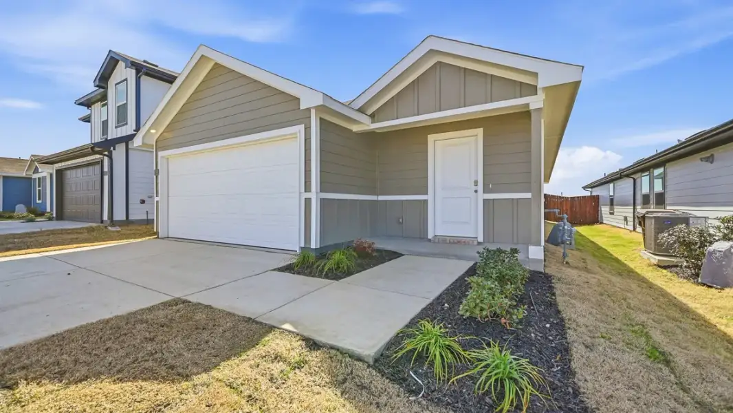 Representative exterior photo of a completed home built from the Caprock by D.R. Horton in Blackbird Estates, Mineral Wells, TX (Image 18).