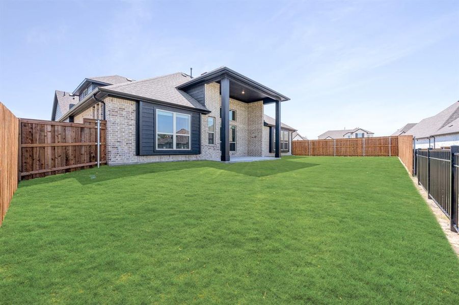 Front exterior of a new home in Devonshire Classic 60-65, Forney, TX, highlighting curb appeal (Image 26). Front exterior of a new home in Devonshire Classic 60-65, Forney, TX, highlighting curb appeal (Image 26).
