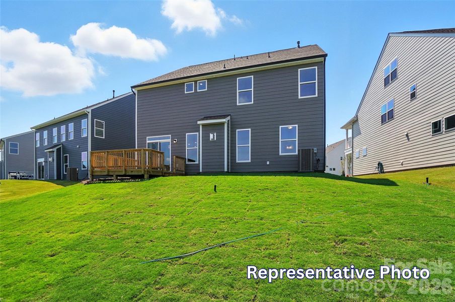 Exterior details and patio area of a home in Enclave at Riverdale, Huntersville (Image 23).