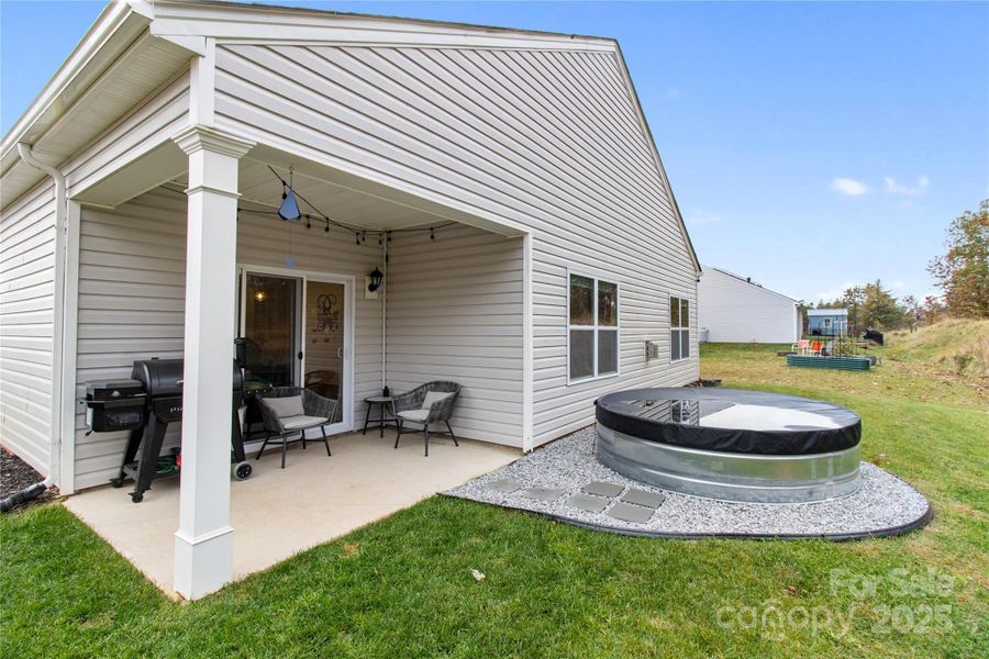 Patio area with stock tank pool Patio area with stock tank pool