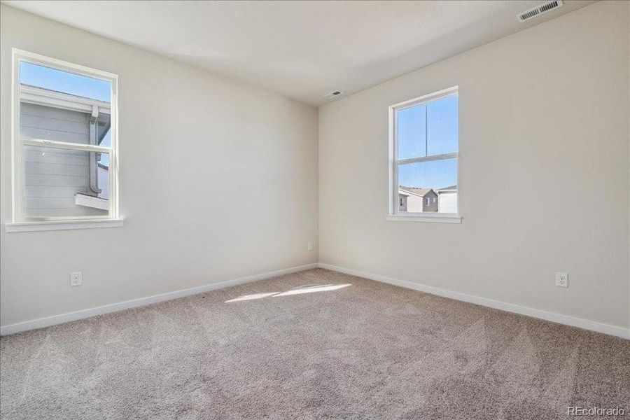 Spacious, unfurnished interior of a new home in Floret Collection at Alder Creek, Parker (Image 22).