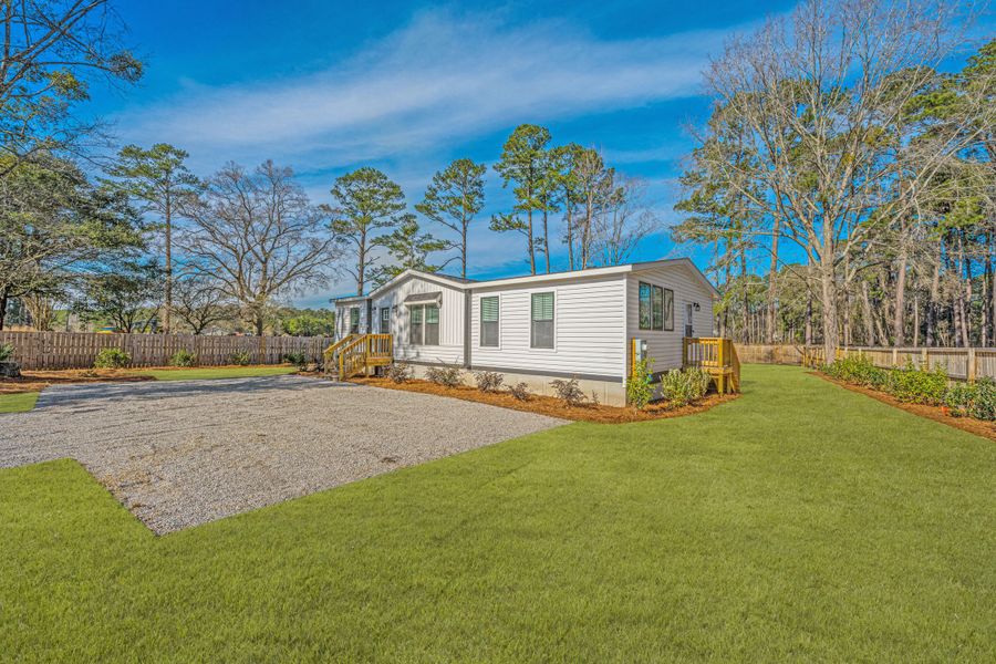 Exterior details and patio area of a home in , Summerville (Image 16).