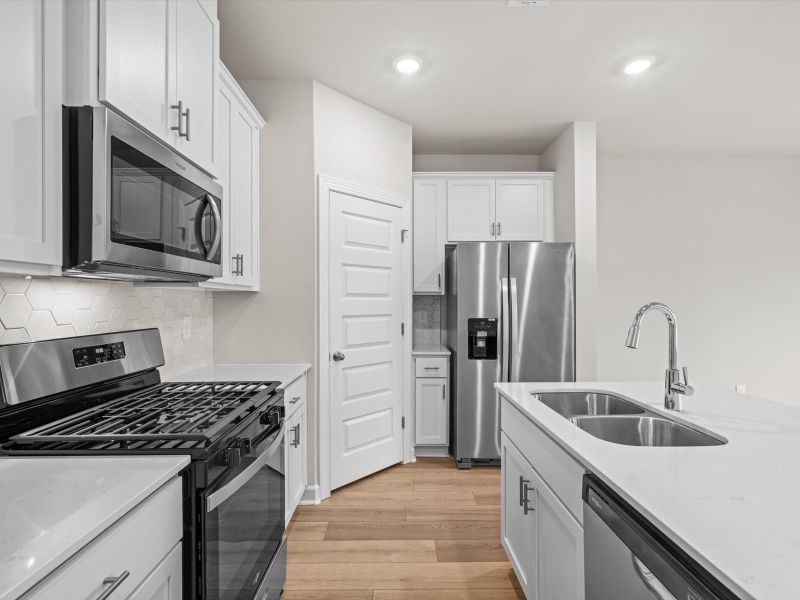 Furnished interior view inside a new home in Crossing at Abner Creek Townes, Greer (Image 6).