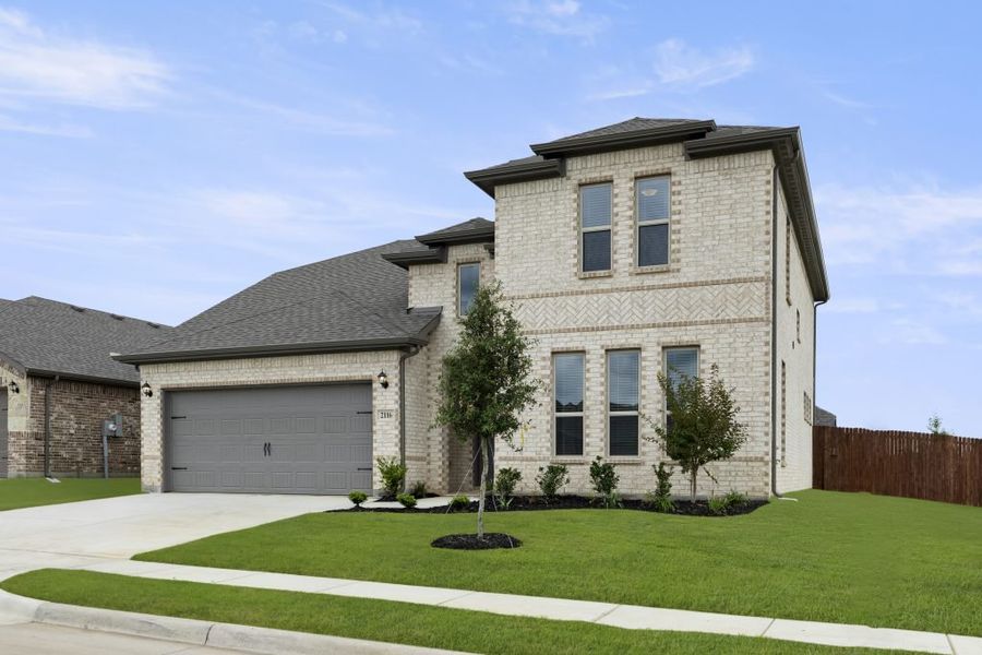 Representative exterior photo of a completed home built from the Phoenix by Impression Homes in Keeneland, Aubrey, TX (Image 2). Representative exterior photo of a completed home built from the Phoenix by Impression Homes in Keeneland, Aubrey, TX (Image 2).