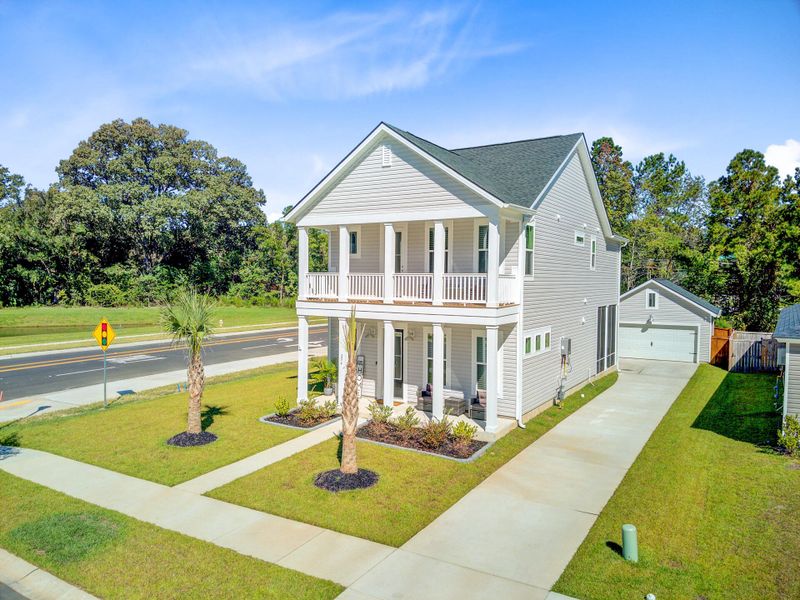 Front exterior of a new home in Limehouse Village: Row Collection, Summerville, SC, highlighting curb appeal (Image 24).