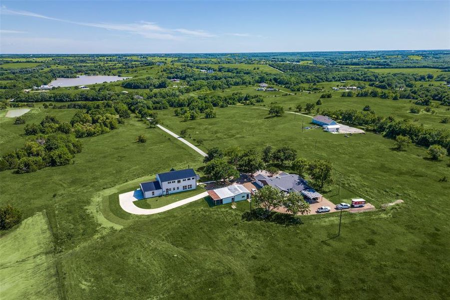 Aerial view featuring a rural view Aerial view featuring a rural view