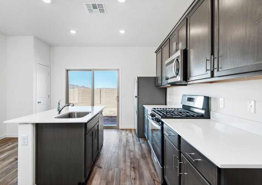 The kitchen comes with a full suite of stainless steel appliances!