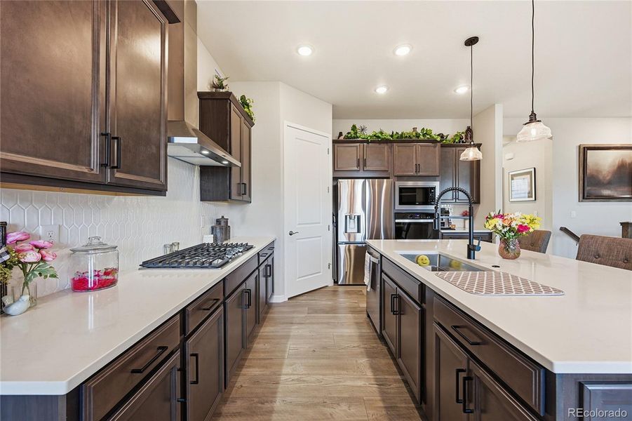 Furnished interior view inside a new home in Hilltop at Inspiration, Aurora (Image 28).
