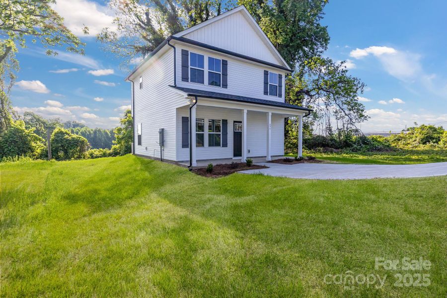 Front exterior of a new home in , Statesville, NC, highlighting curb appeal (Image 18).