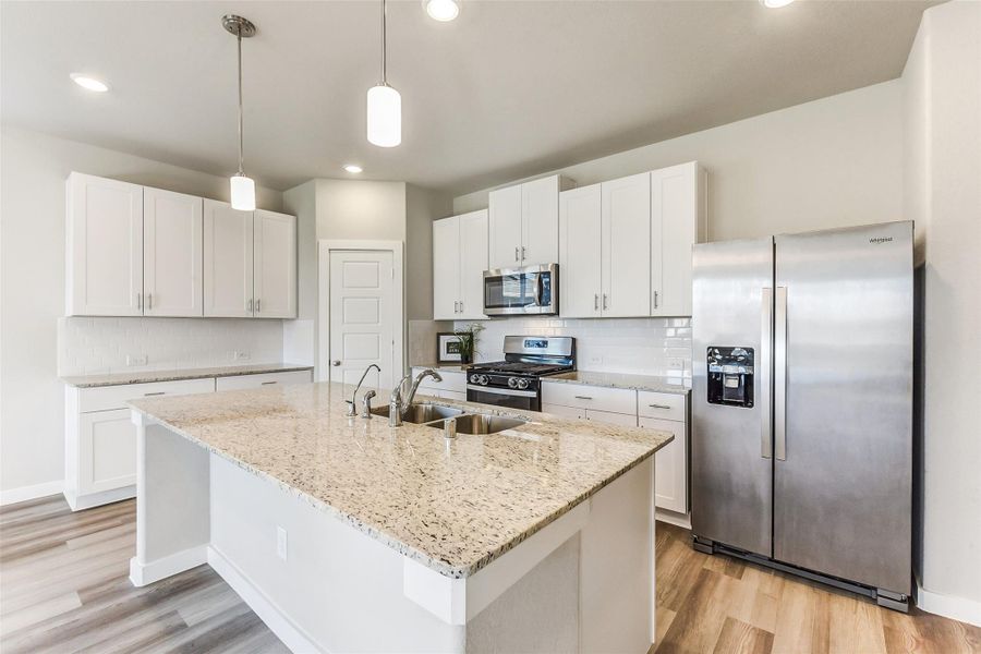 Furnished interior view inside a new home in Sundance Cove - Premier Series, Crosby (Image 12).