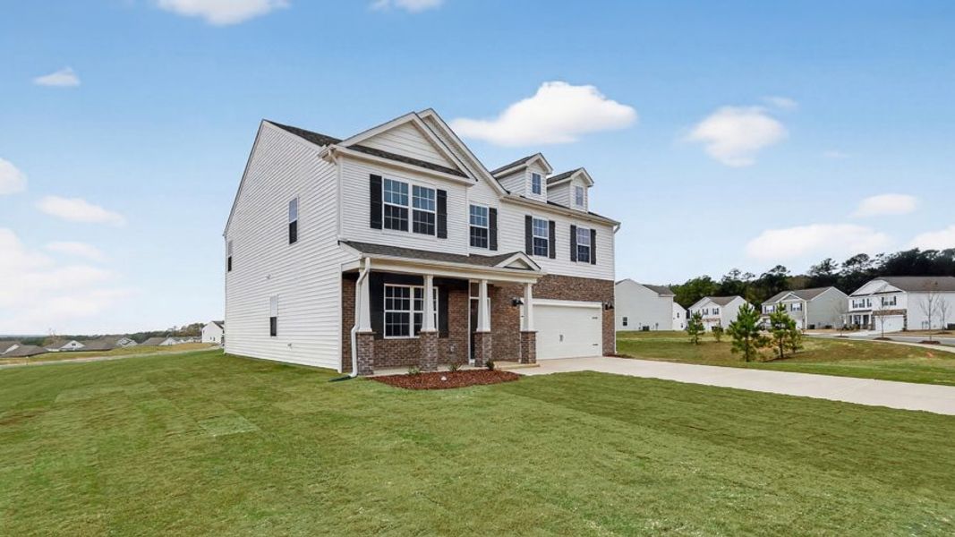 Front exterior of a new home in North Gate, Vass, NC, highlighting curb appeal (Image 16). Front exterior of a new home in North Gate, Vass, NC, highlighting curb appeal (Image 16).