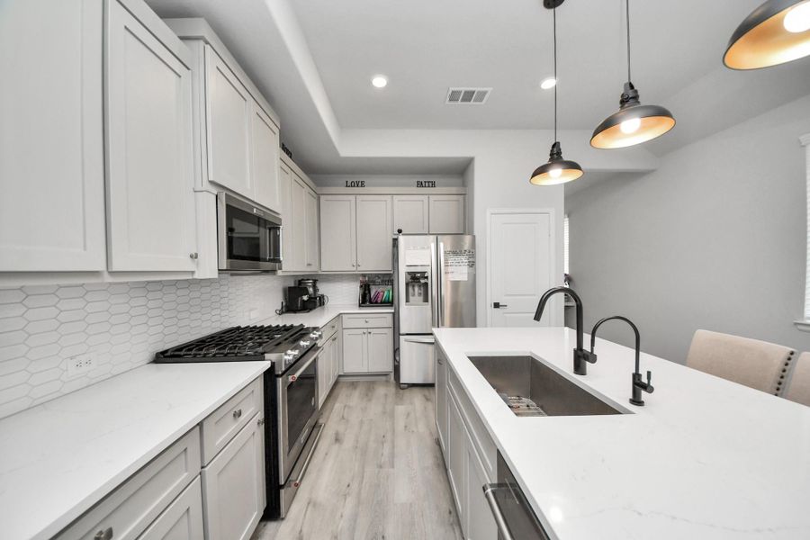 Furnished interior view inside a new home in , Conroe (Image 18).