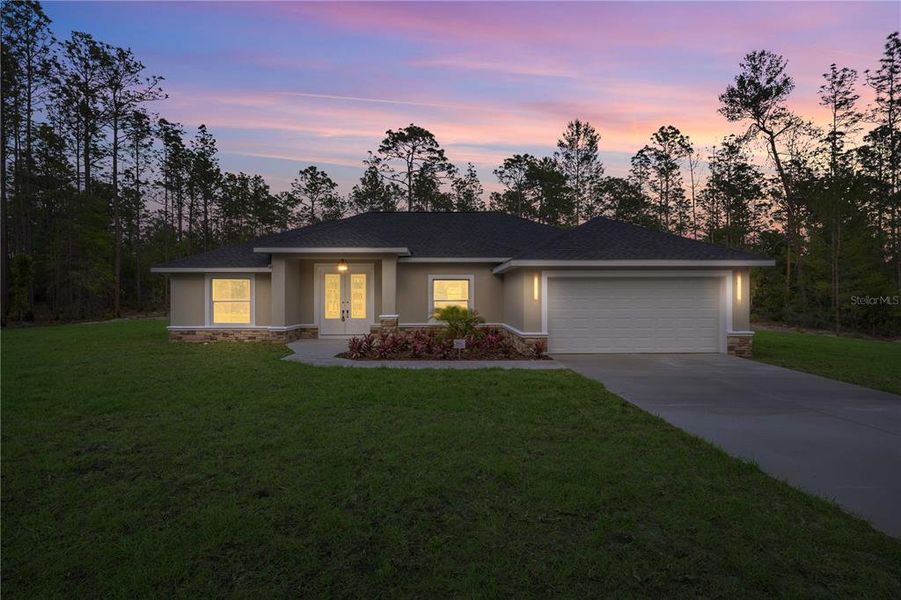 Front exterior of a new home in , Ocala, FL, highlighting curb appeal (Image 18).