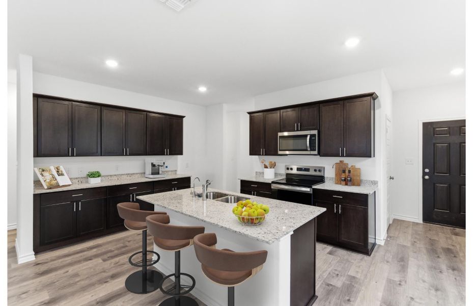 Furnished interior view inside a new home in Vista Real, Converse (Image 6).