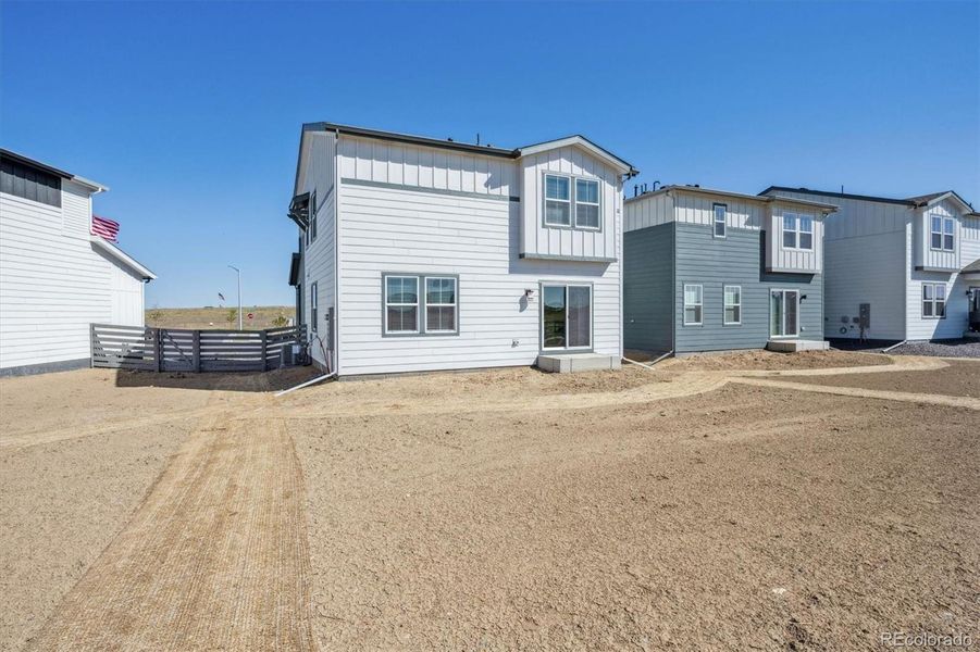 Exterior details and patio area of a home in Legato, Commerce City (Image 18).