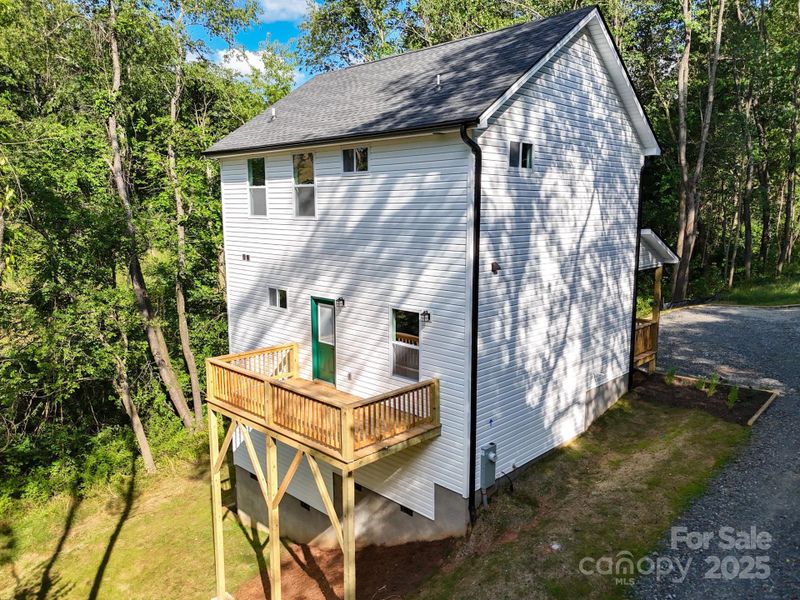 Front exterior of a new home in , Waynesville, NC, highlighting curb appeal (Image 1). Front exterior of a new home in , Waynesville, NC, highlighting curb appeal (Image 1).