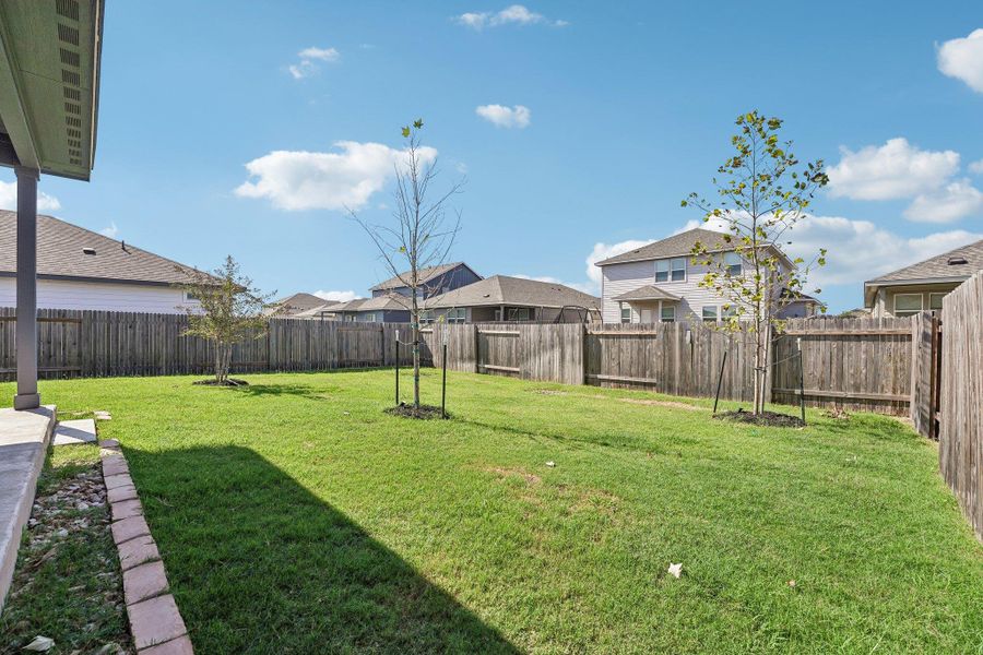 Exterior details and patio area of a home in Waterstone Crossing, Kyle (Image 20).