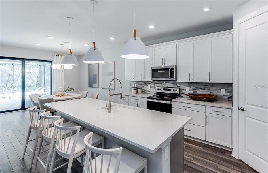 Furnished interior view inside a new home in Grandura, Sarasota (Image 11).