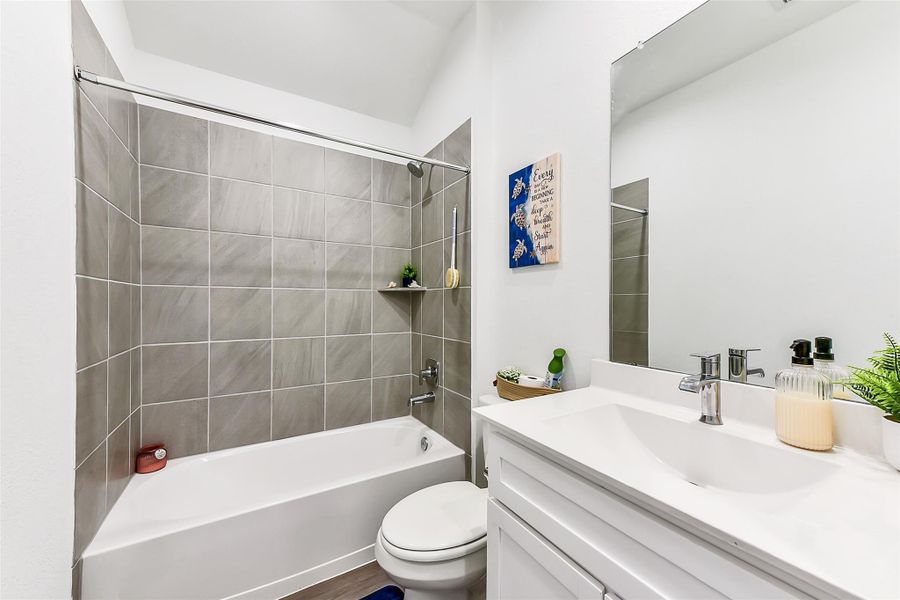 Furnished interior view inside a new home in Sunterra, Katy (Image 32).