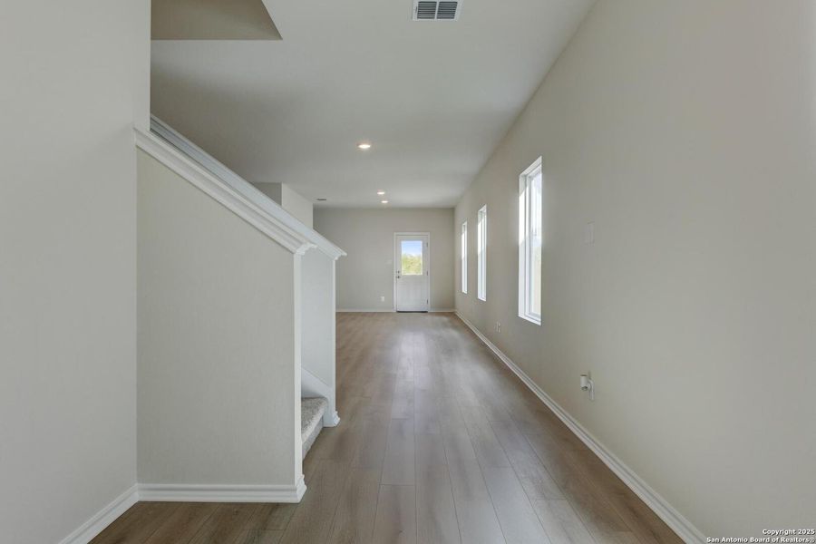 Spacious, unfurnished interior of a new home in Meadows at Hennersby Hollow 40's, San Antonio (Image 28).
