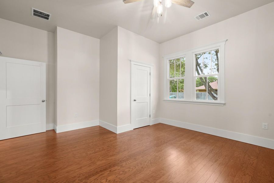 Hardwood floors and generous windows create a light-filled, inviting atmosphere in this comfortable space. Hardwood floors and generous windows create a light-filled, inviting atmosphere in this comfortable space.
