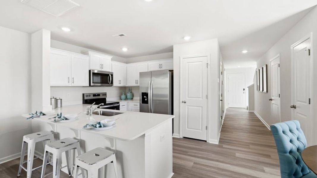 Furnished interior view inside a new home in Tanglewood Townes, Greenville (Image 14).