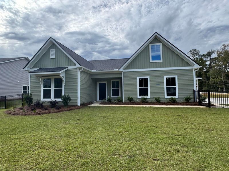 Front exterior of a new home in Central Estates, Summerville, SC, highlighting curb appeal (Image 20).