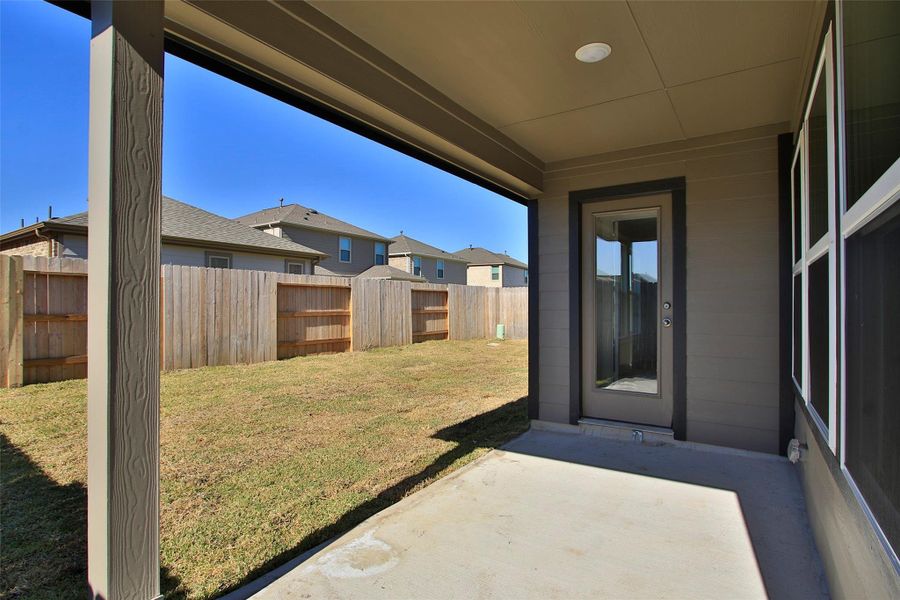 Exterior details and patio area of a home in Sunterra, Katy (Image 3).