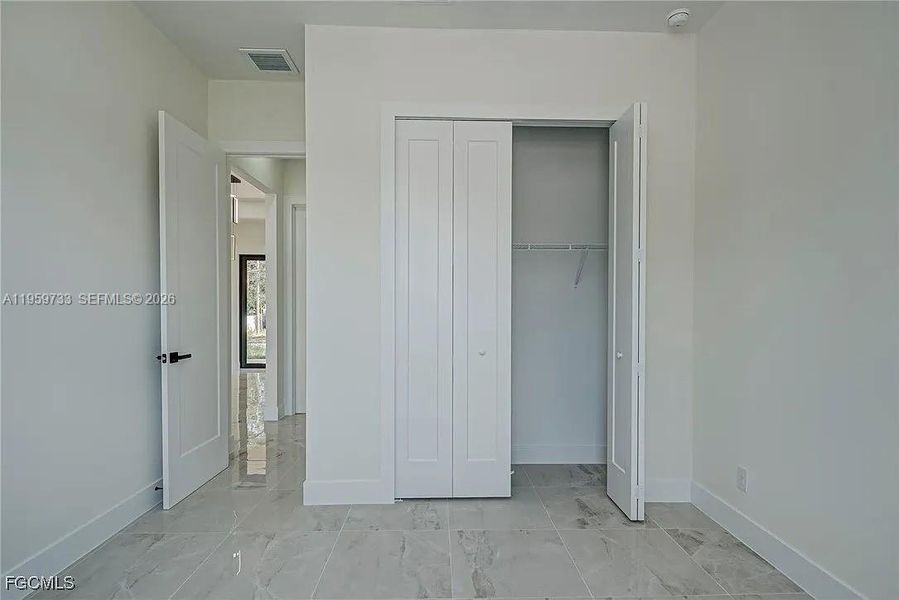 Spacious, unfurnished interior of a new home in , Lehigh Acres (Image 21).