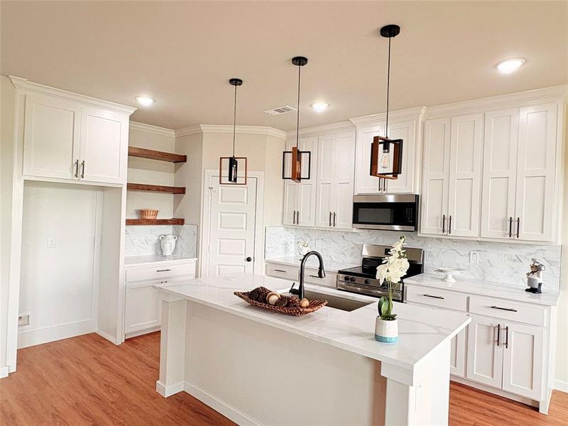 Furnished interior view inside a new home in , Quinlan (Image 12).