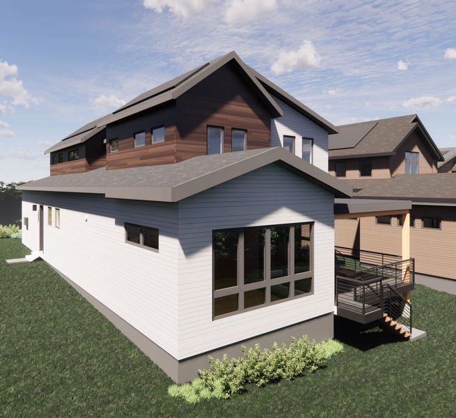 photo 4:The rear elevation showcases seamless indoor–outdoor living with expansive windows and direct access to the covered back deck. Enjoy natural light, privacy, and a peaceful setting ideal for everyday relaxation or entertaining.