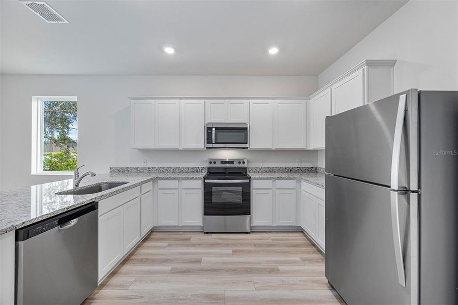 Furnished interior view inside a new home in Poinciana, Poinciana (Image 6). Furnished interior view inside a new home in Poinciana, Poinciana (Image 6).
