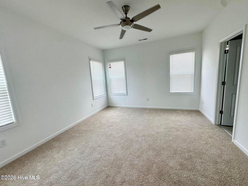 Spacious, unfurnished interior of a new home in Coastal Haven, Leland (Image 11).