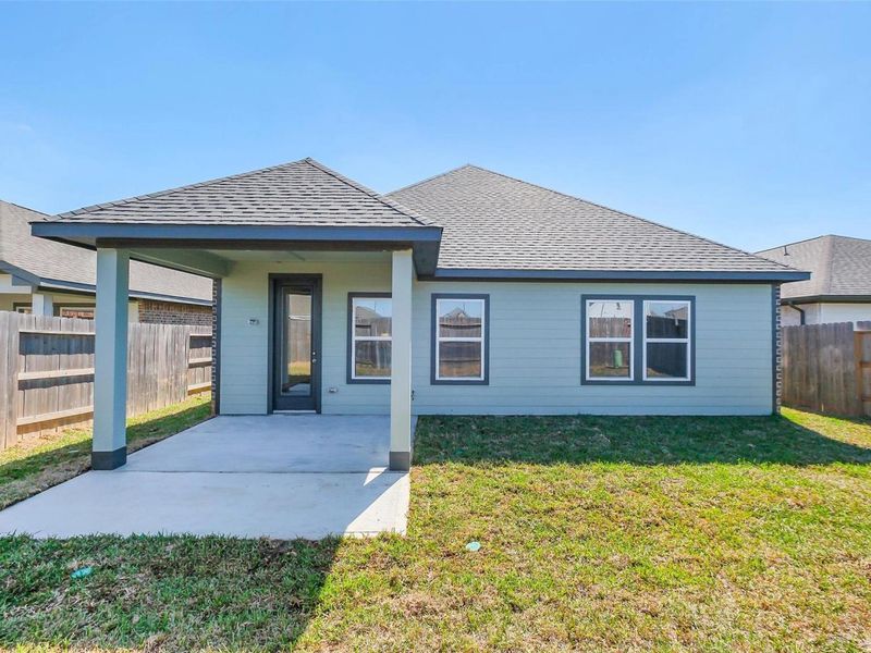 Exterior details and patio area of a home in Sunterra, Katy (Image 22).