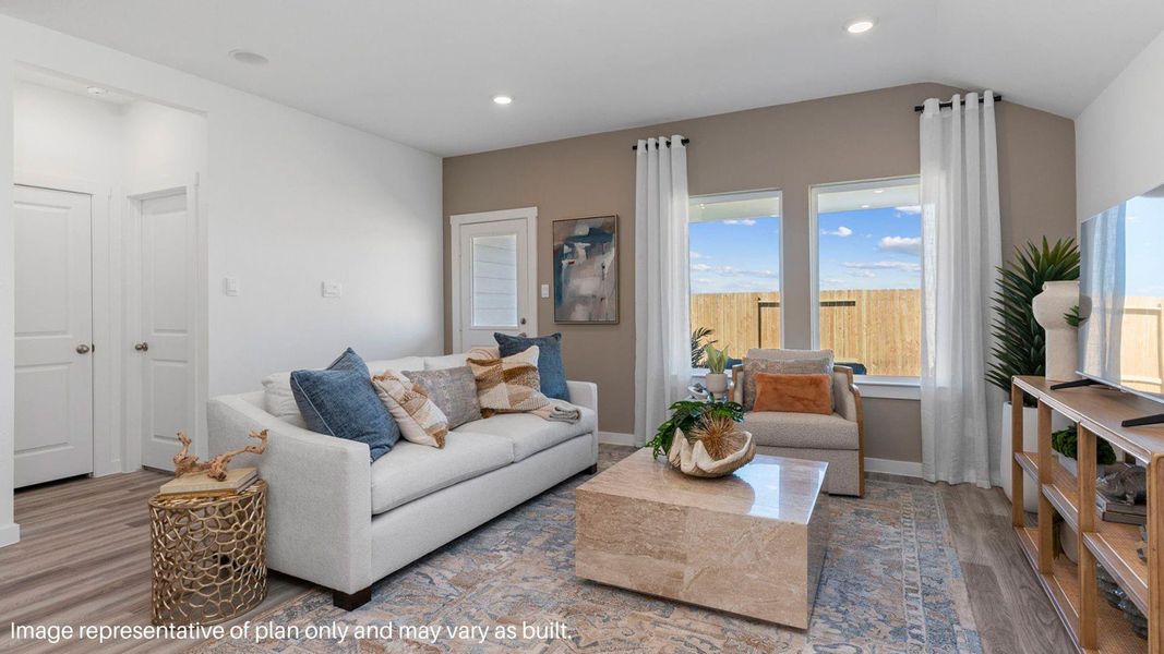 Furnished interior view inside a new home in Caldwell Crossing, Iowa Colony (Image 4).