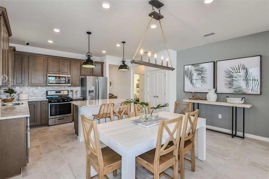 Furnished interior view inside a new home in Del Webb Sunbridge, St. Cloud (Image 7).