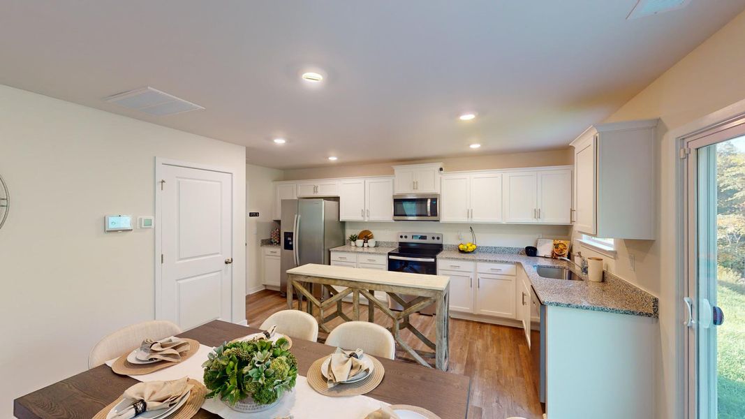Furnished interior view inside a new home in Cardinal Creek, Charlotte (Image 7).