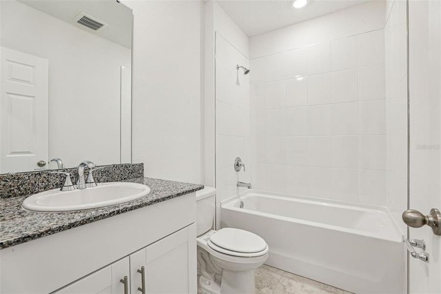 Furnished interior view inside a new home in Lawson Dunes - Signature Series, Haines City (Image 11). Furnished interior view inside a new home in Lawson Dunes - Signature Series, Haines City (Image 11).