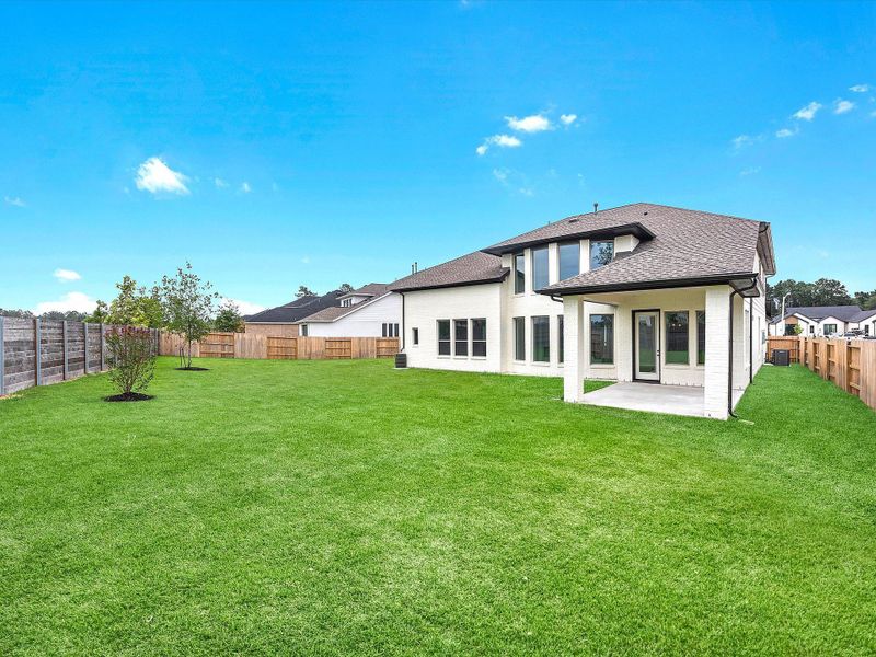 Representative exterior photo of a completed home built from the The Calistoga by Westin Homes in ARTAVIA® - 65' Art Collection, Conroe, TX (Image 16). Representative exterior photo of a completed home built from the The Calistoga by Westin Homes in ARTAVIA® - 65' Art Collection, Conroe, TX (Image 16).