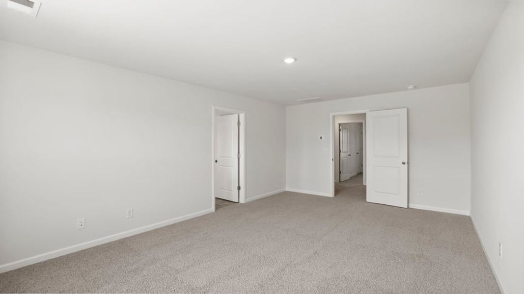 Spacious, unfurnished interior of a new home in Durbin Meadows Traditions, Fountain Inn (Image 34).