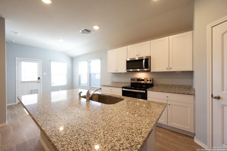 Furnished interior view inside a new home in , Seguin (Image 8).