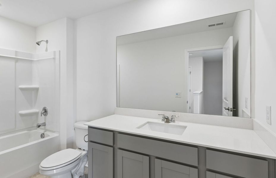 Furnished interior view inside a new home in Highlands of Carter's Station, Columbia (Image 10).